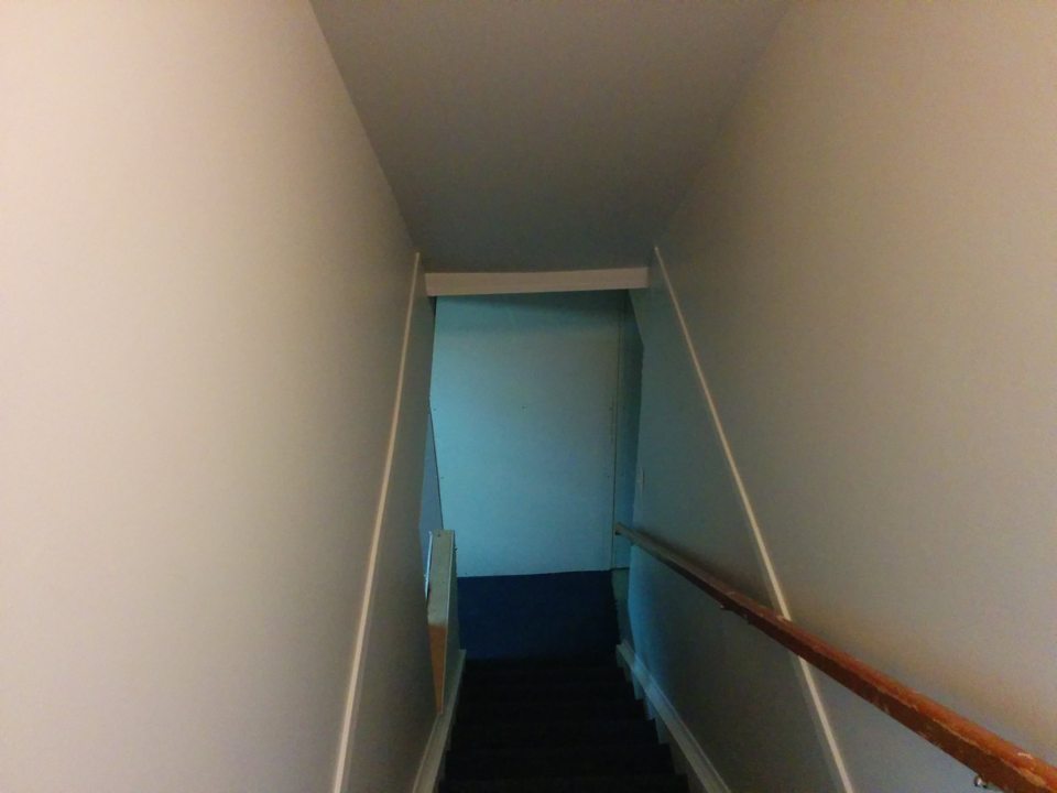 Two bedroom stairs to basement